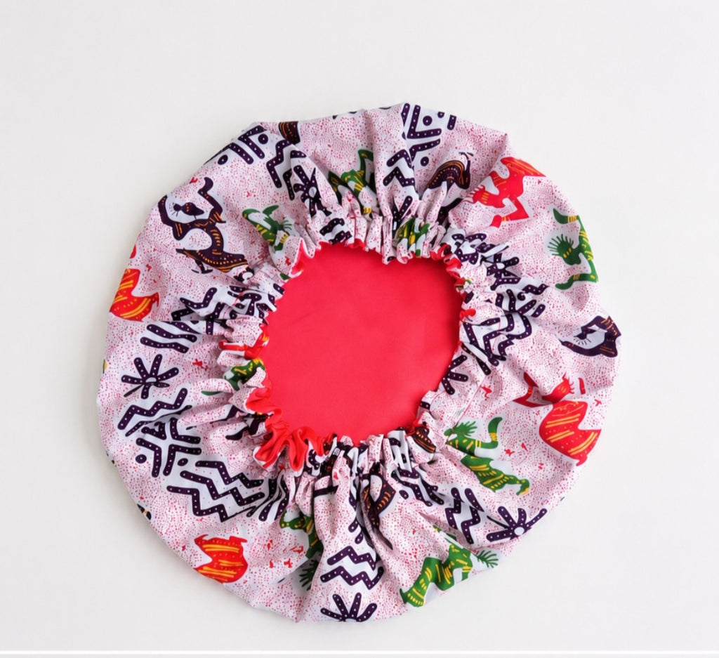 African Rhythm Satin Hair Bonnet – Protect your crown in style with the African Rhythm Satin Hair Bonnet — where tradition meets hair care. 👑✨